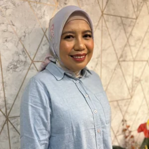 Dewi Rahmarini, S.Sos.M.Kom